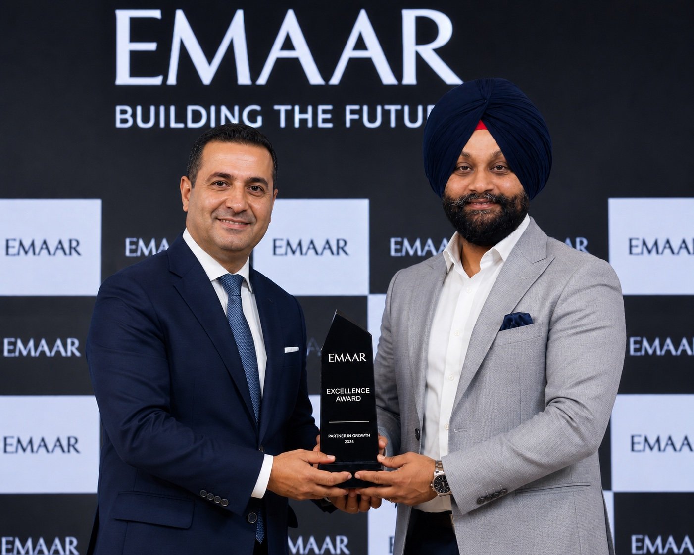 99Bricks receiving the Emaar Excellence Award, Partner in Growth 2024