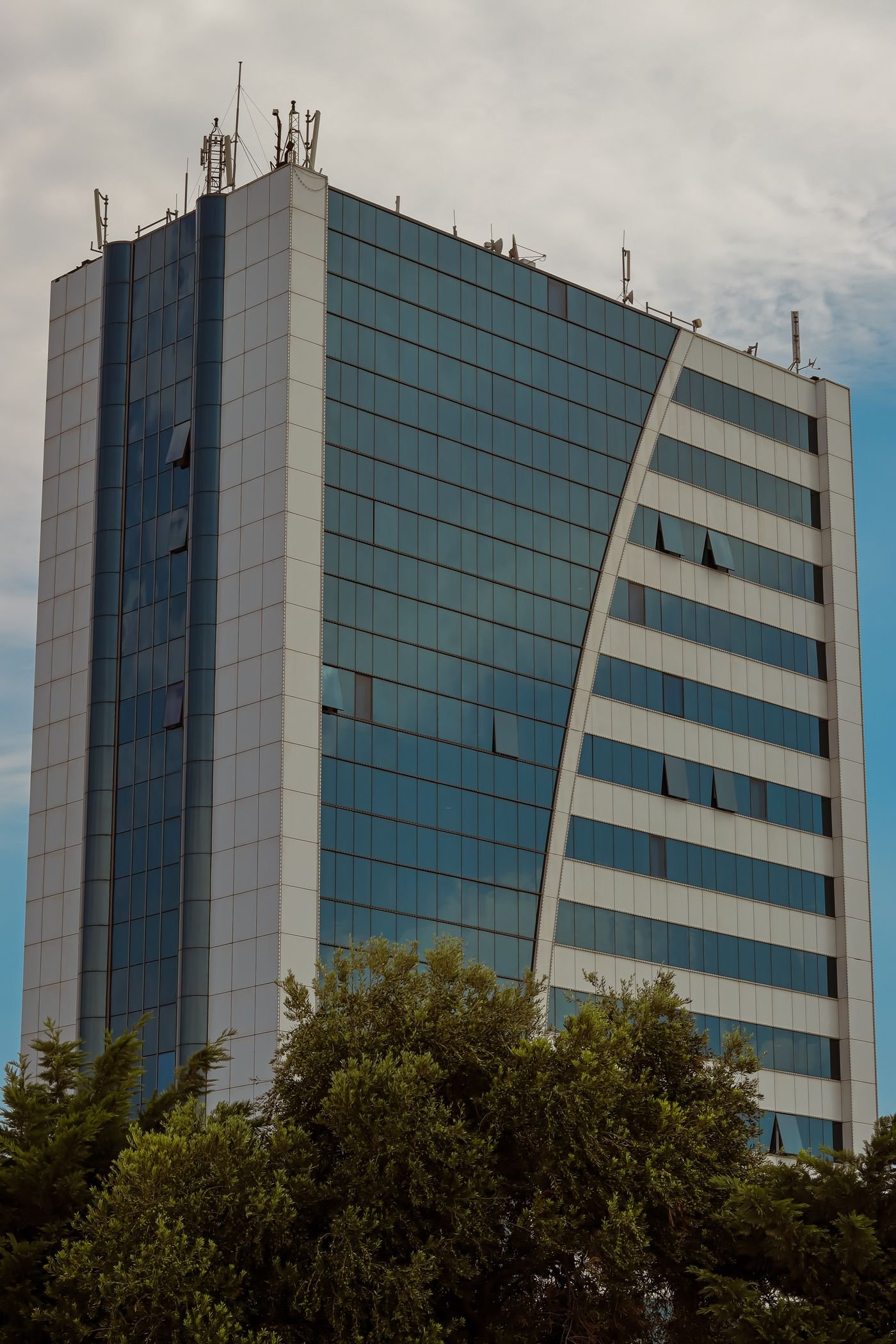 Modern commercial tower with a glass facade